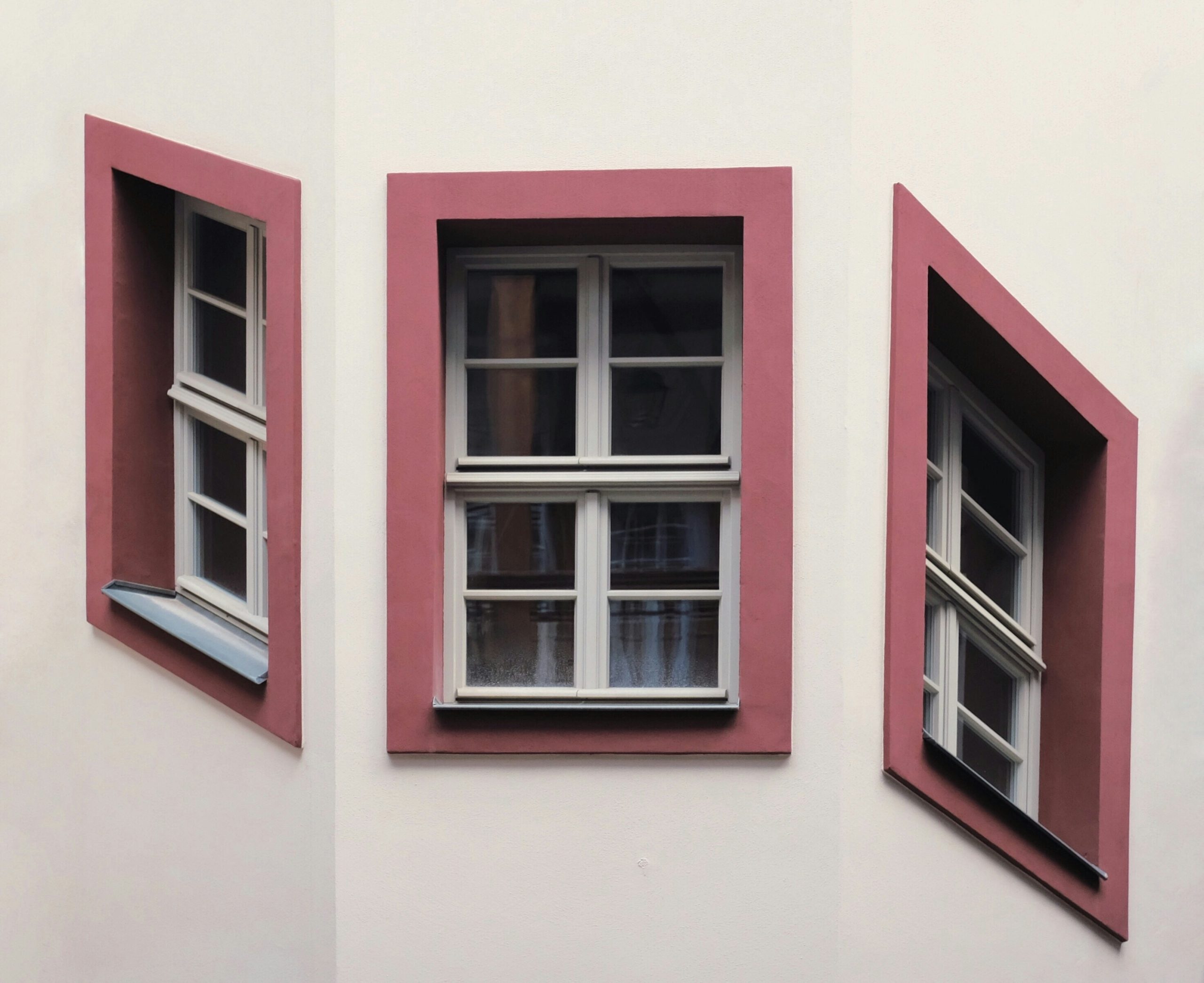 triple-windows-outside-view three-windows-outside-facing different-directions